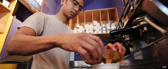 Image of a male servant serving coffee